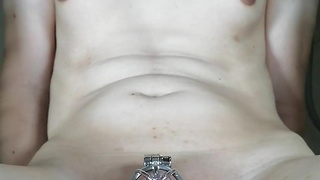 This trans girl loves small chastity cages and huge dildos