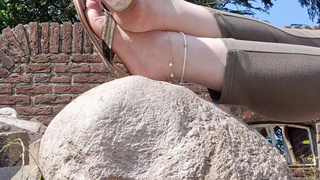 Clapping and dangling my flipflopt on my heels and toes outside. Does it turns you on?????