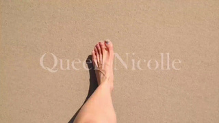 Queen's feet on the beach