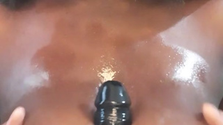 Oiled up dildo titty fuck
