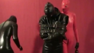 Threesome Latex Catsuits Two Femdom Girls Bondaged Slave In Straightjacket