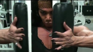 Big Breasted FBB Performs Pec Deck Muscle Explosion in Gym