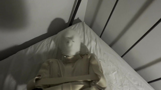 Femboy in straitjacket getting a handjob by his mistress