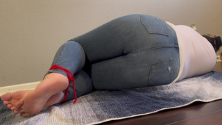 Amb3r Lynn tied up and made to pee her sexy jeans