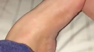 Slave Sucks my Toes while I relax on Holiday!