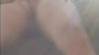 FBB plays with her giant clit outdoors.