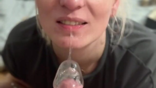 POV Blonde milf gives teasing blowjob inside a cock sleeve