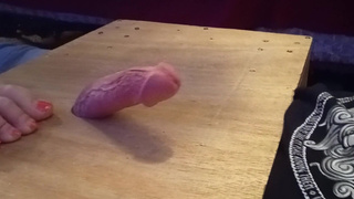 Hard slaps and teasing a trapped cock