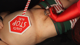 Santa's helper gets spanked and ballbusted