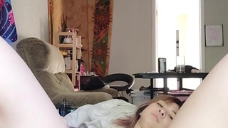 Cute Asian teen plays with her self