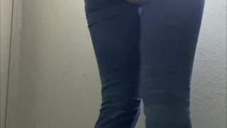 OL wearing jeans in front of a public toilet desperate to pee