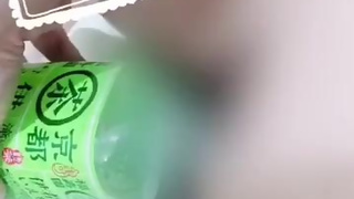 Japanese girl pee in a bottle on the way home