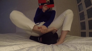 sitting on his face and reading my new book