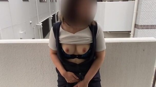 Standing masturbation on the balcony