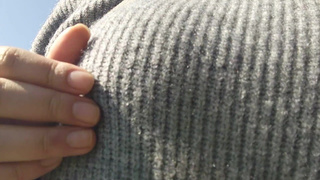 Busty Japanese woman cums with outdoor nipple masturbation.