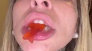 Your sexy giantess Ashley chews and swallows gummy sharks