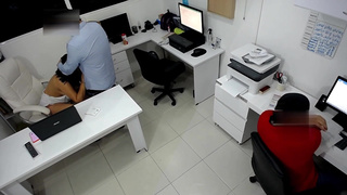 Girl boss fucks her coworker next to the assitent