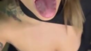 Your giantess Ashley shows you the inside of her mouth and makes sounds like she's giving you a blow