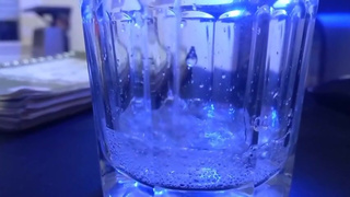 Giantess Jenna drinks a tiny and swallows it