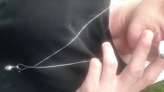 Smoking cigarette in black pantyhose outside make hole for my clit and turn off cigaret by my Pee