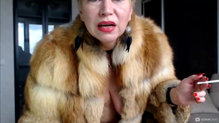 Mature Russian webcam whore AimeeParadise in a fur coat blows smoke in face of her virtual slave!