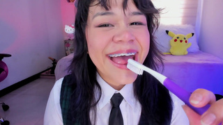 Lila Jordan brushes her saliva teeth