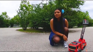 Destroy crush, trample, crushing Big large fire truck with ballerinas and sneakers kick hard