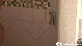 Amazing girl is wet and soapy in shower