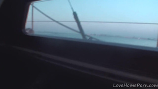 Beautiful girls eat each other on a boat