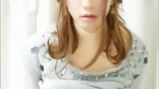 Horny ladyboy wearing a corset masturbate her dick with anal toys