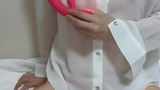 I press a sex toy against my beautiful nipples through a shirt