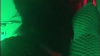 Femboy sissy Lisa Rhea sucking two cocks thru gloryhole eating 2 loads cum facial