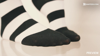 Giantess Alice crushes tiny villager under her socks