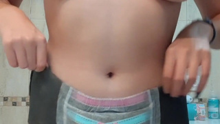 Diaper girl in her drynites diapers