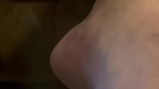 Hot guy has his feet up while locked in a chastity! Huge cumshot at the end!