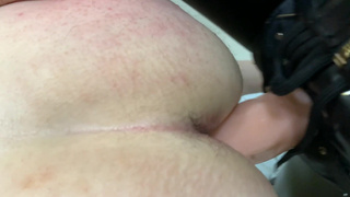 Ass up & head down femdom strap-on in chastity Dominatrix Nika fuckes slave's ass on the couch.