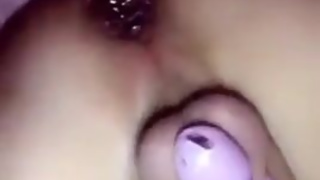 Sissy slut in pink chastity cage butt plug in her ass