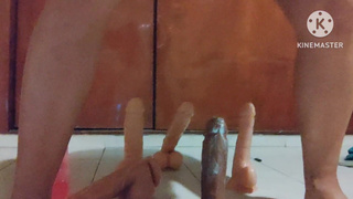 Sissy in chastity trying many dildos up her horny asshole