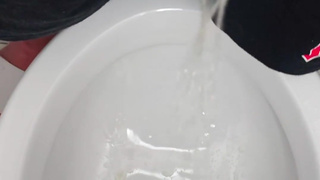 I try to pee with a cheap chastity cage