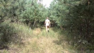 Walking naked in woods enclosed in chastity cage