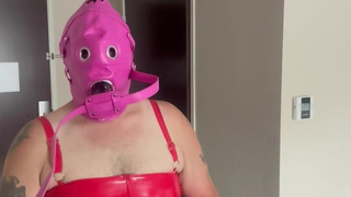 Sissy in chastity bondage hood