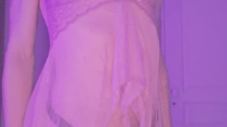 Naughty femboy in transparent nightie shows her chastity cage and tiny ass