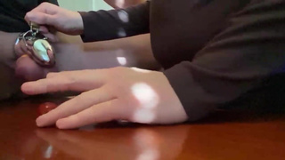 Threatening to smash his balls like grapes