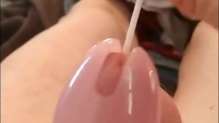 sissy femboy chrissy jacks off cums in chastity cage