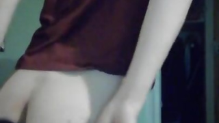 Young sissy trans girl doing a daring strip-tease