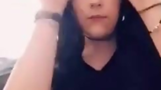 Trans girl in chastity fucks herself