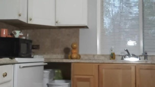 Male sub mops the dirty floor like a dog in tight restraints and chastity