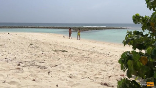 Pervert cummed on vacationing girls while they were sunbathing on a public beach