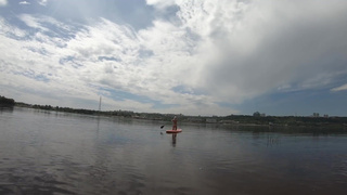 Naked gymnastics on the sup board