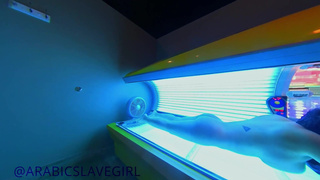 Arabic Slut has Orgasm in Public Tanning Bed